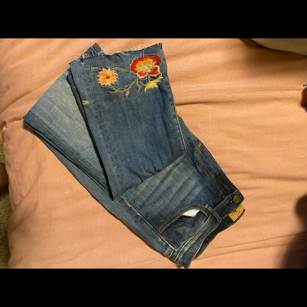 Driftwood jeans with flower embroidery at hem. Never been worn